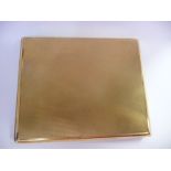 A 14ct gold folding cigarette case with engine turned decoration,