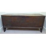 A mid 18thC boarded elm chest with a hinged lid,