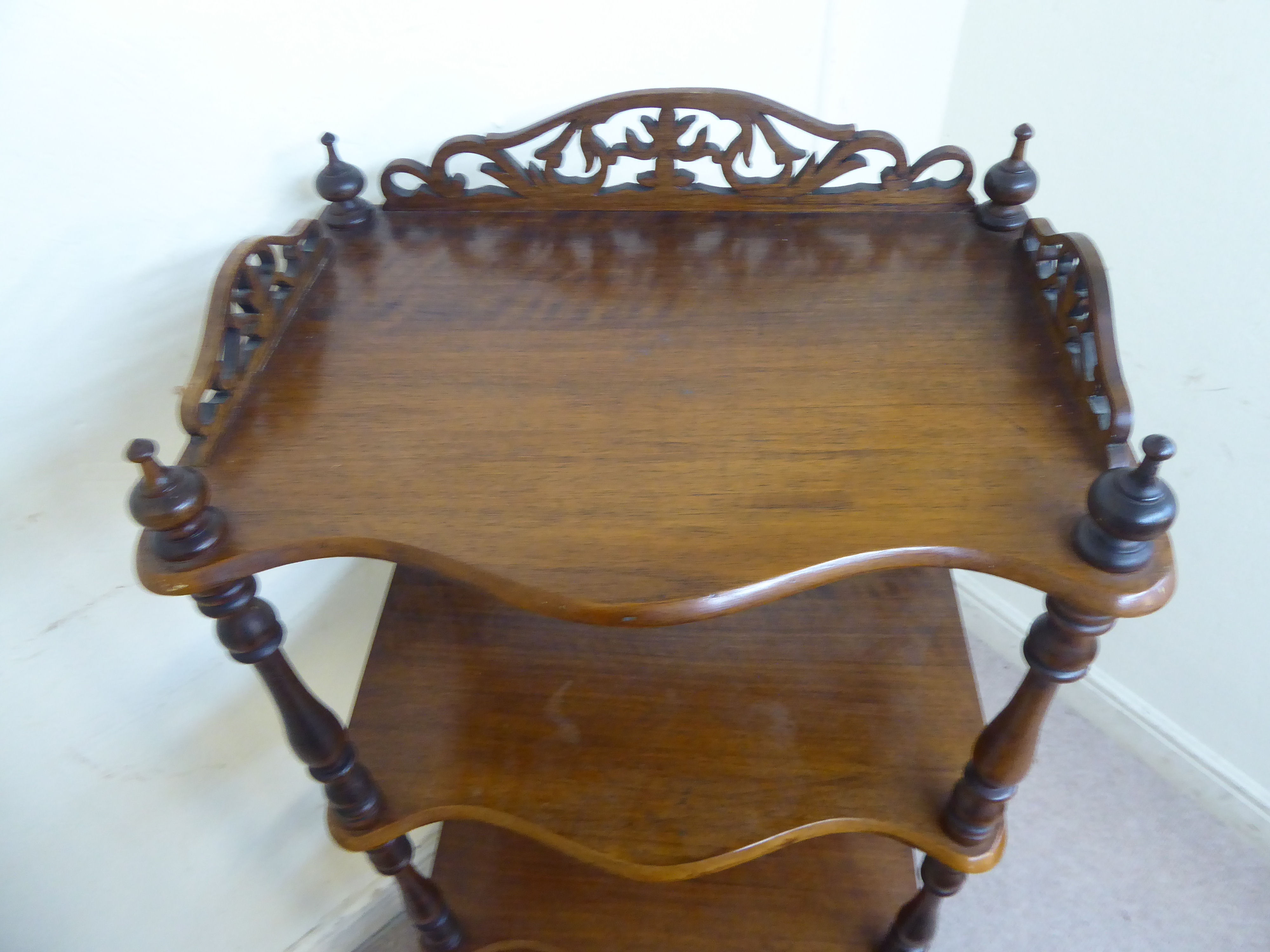 A late Victorian walnut four tier serpentine front what-not, - Image 6 of 8