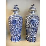 A pair of late 19th/early 20thC Chinese porcelain temple jars,