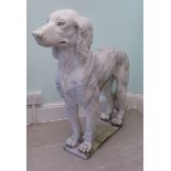 A modern carved white and mottled grey marble sculpture, a standing hound,