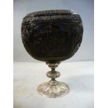 A mid 18thC finely carved coconut cup,