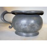 A 19thC pewter pot of ogee form with a flattened, everted rim and a hollow S-scrolled handle 7.