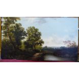 Early 20thC British School - a woodland landscape with a figure by a bridge over a river oil on