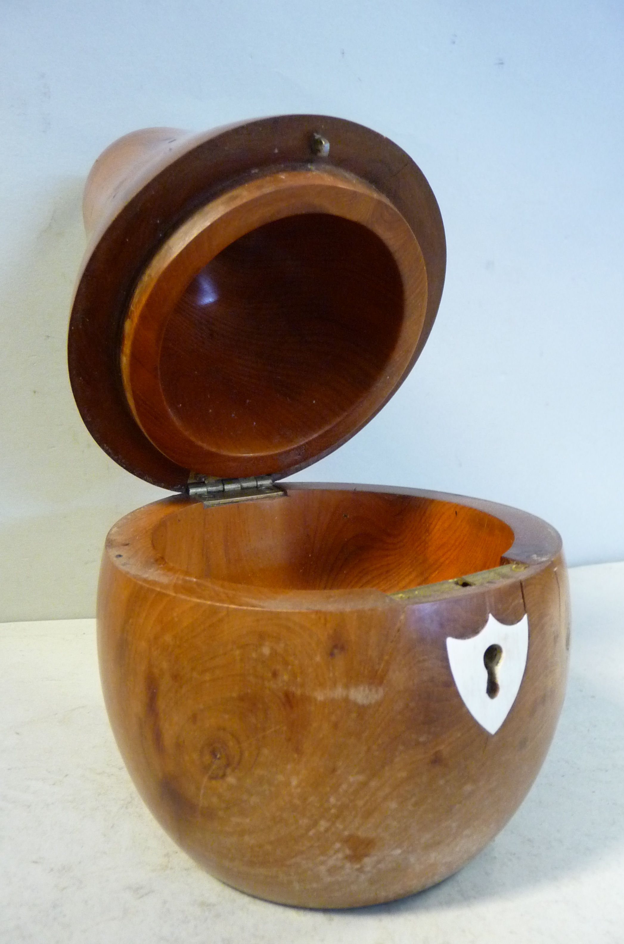 A 20thC turned and carved fruitwood tea caddy, in the form of a pear with a lockable, hinged lid 7. - Image 7 of 8