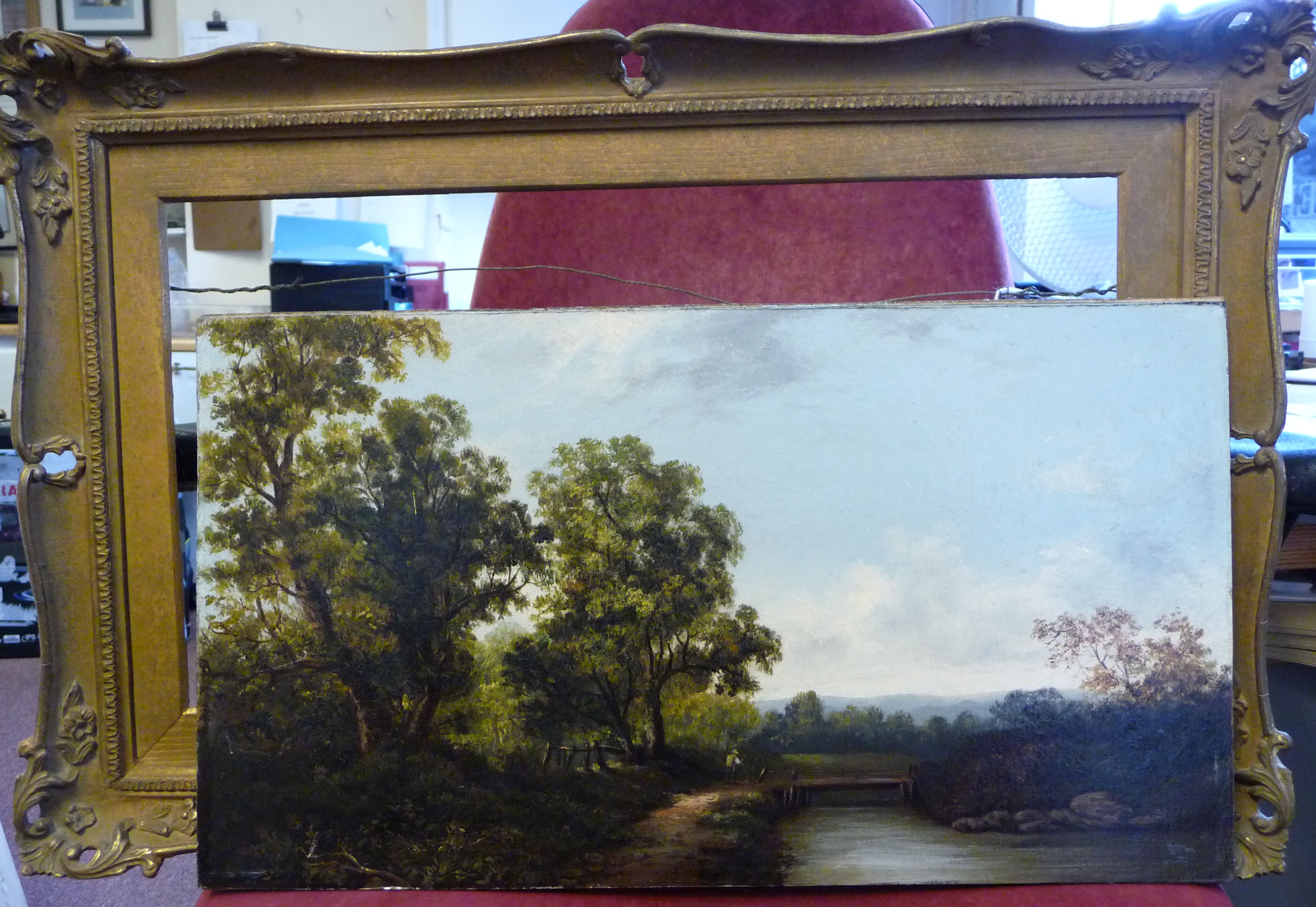 Early 20thC British School - a woodland landscape with a figure by a bridge over a river oil on - Image 4 of 4