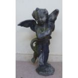 A 19thC cast lead figure, a standing cherub,