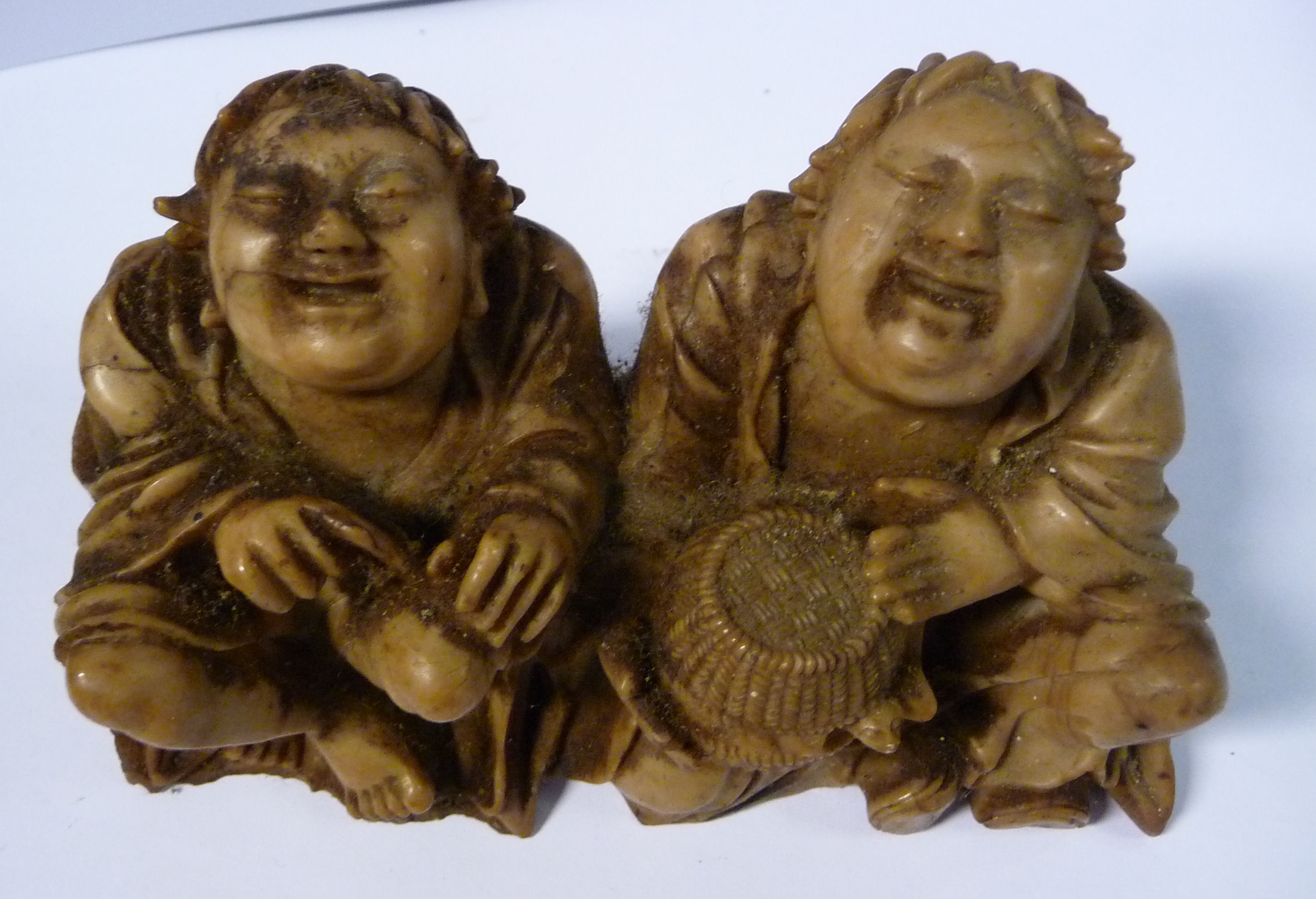 An 18th/19thC Chinese carved light brown soapstone group, two seated corpulent fishermen, - Image 3 of 12