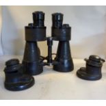 A pair of World War II Leitz textured black metal cased binoculars,