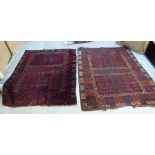 Two similar North West Persian rugs,