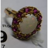 A 9ct gold opal and ruby cluster ring