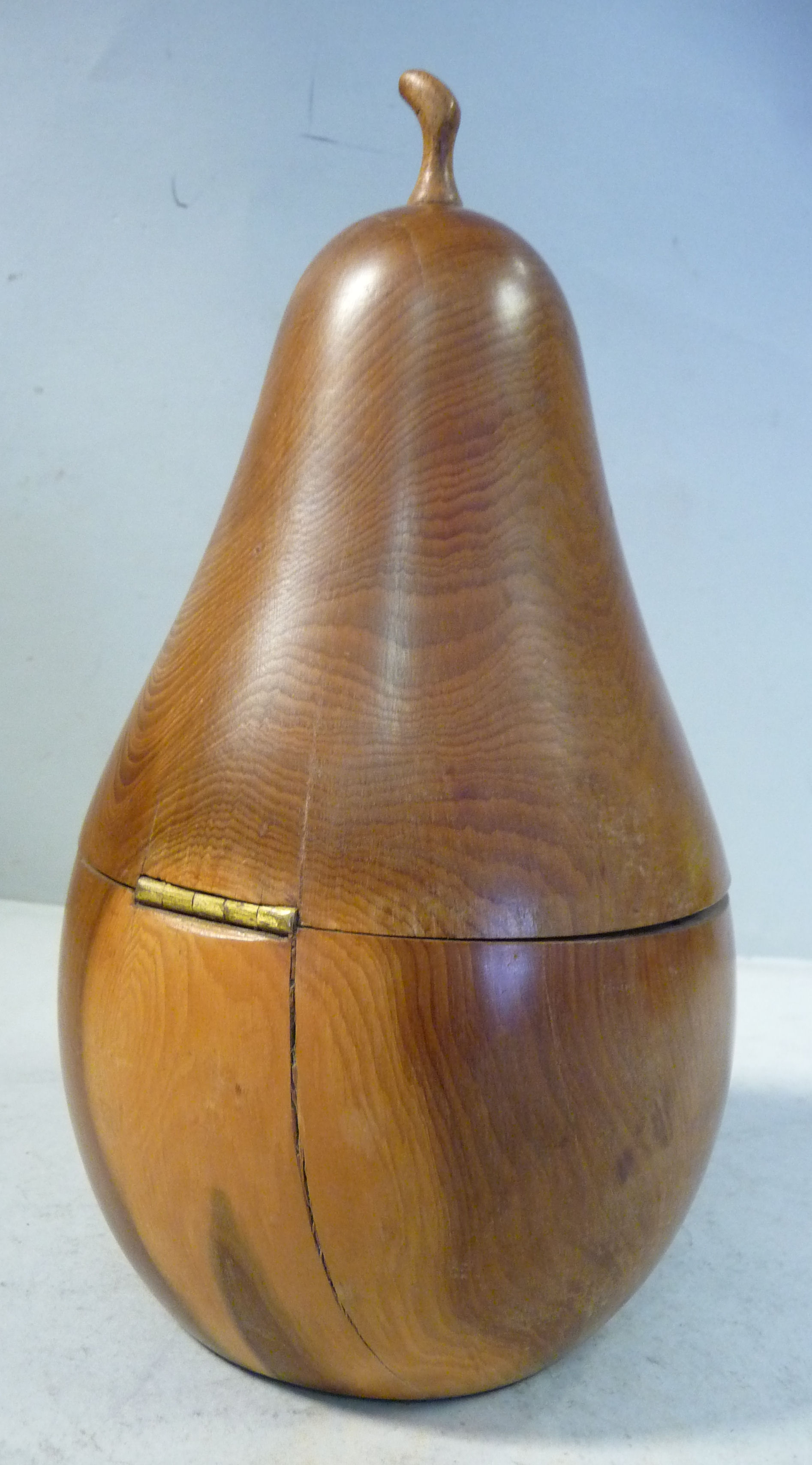 A 20thC turned and carved fruitwood tea caddy, in the form of a pear with a lockable, hinged lid 7. - Image 3 of 8