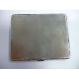 A silver folding cheroot case of curved, cushion form,