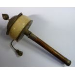 A late 19thC Tibetan bamboo, white metal and bone hand-held prayer wheel,