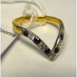 An 18ct gold wishbone design ring,