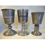 Three 18th/19thC pewter chalices, two with band moulding to the bowls,
