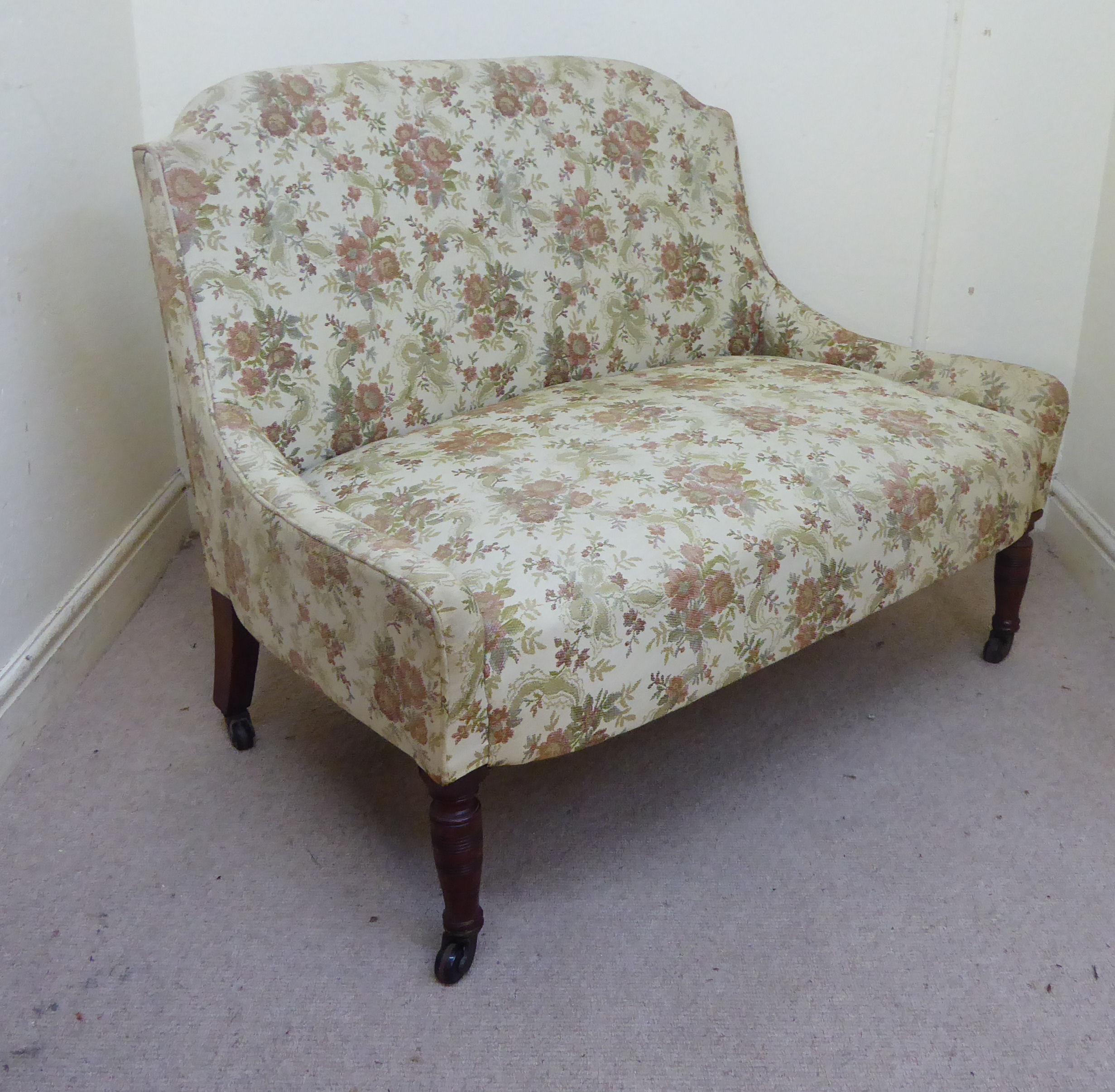 A late Victorian small salon settee, upholstered in a beige coloured, floral fabric, - Image 3 of 8