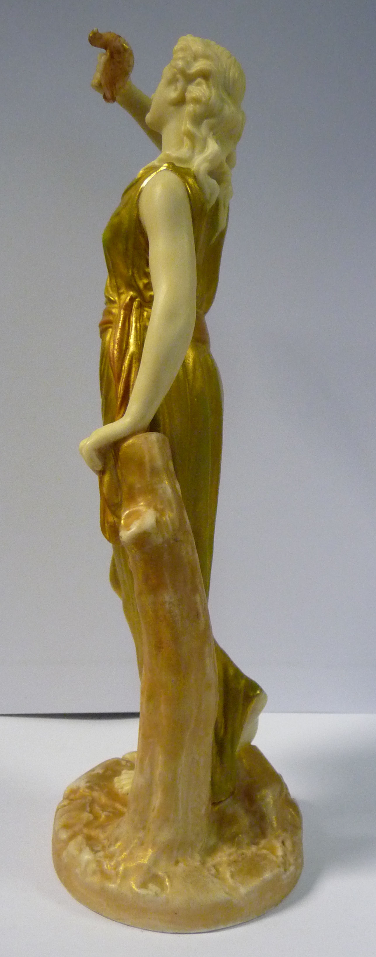 A Royal Worcester gilded and painted satin glazed china figure, a woman holding a dove, - Image 8 of 10