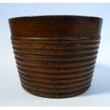 An early 19thC turned and uniformly ribbed fruitwood condiments bowl 3''dia