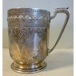 A late Victorian silver Christening mug of straight sided form with an angular,