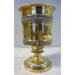 A George III silver gilt wine goblet with straight sides, a flared,