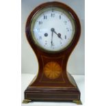 An Edwardian satinwood string inlaid and fan marquetry, mahogany balloon cased mantel clock,