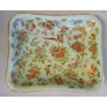A late 19thC Chinese celadon glazed and gilded porcelain rectangular dish, decorated with flora,