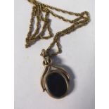 A 9ct gold ropelink neckchain with a plated swivel seal pendant set with bloodstone 11