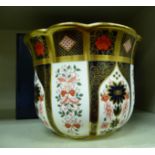 A Royal Crown Derby china Old Imari pattern jardiniere with a wavy lip stamped 1128 MMII 5.