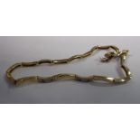 A 9ct gold bracelet of serpentine design,