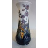 A modern Moorcroft pottery vase of slender, waisted, baluster form,