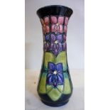 A modern Moorcroft pottery vase of slender, waisted, baluster form,