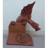 A late Victorian moulded terracotta roof finial, a winged dragon,