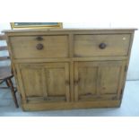 A late Victorian rustically constructed pine dresser,