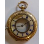 A lady's gold coloured metal cased half hunter fob watch with engraved ornament and an enamelled