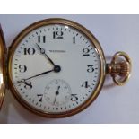 A Waltham 9ct gold cased half hunter pocket watch with enamelled black Roman numerals,