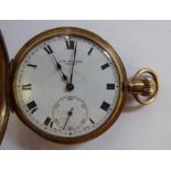 A JW Benson 9ct gold cased half hunter pocket watch with enamelled black numerals,
