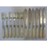 A set of six late Victorian bright-cut engraved silver fish knives and forks,