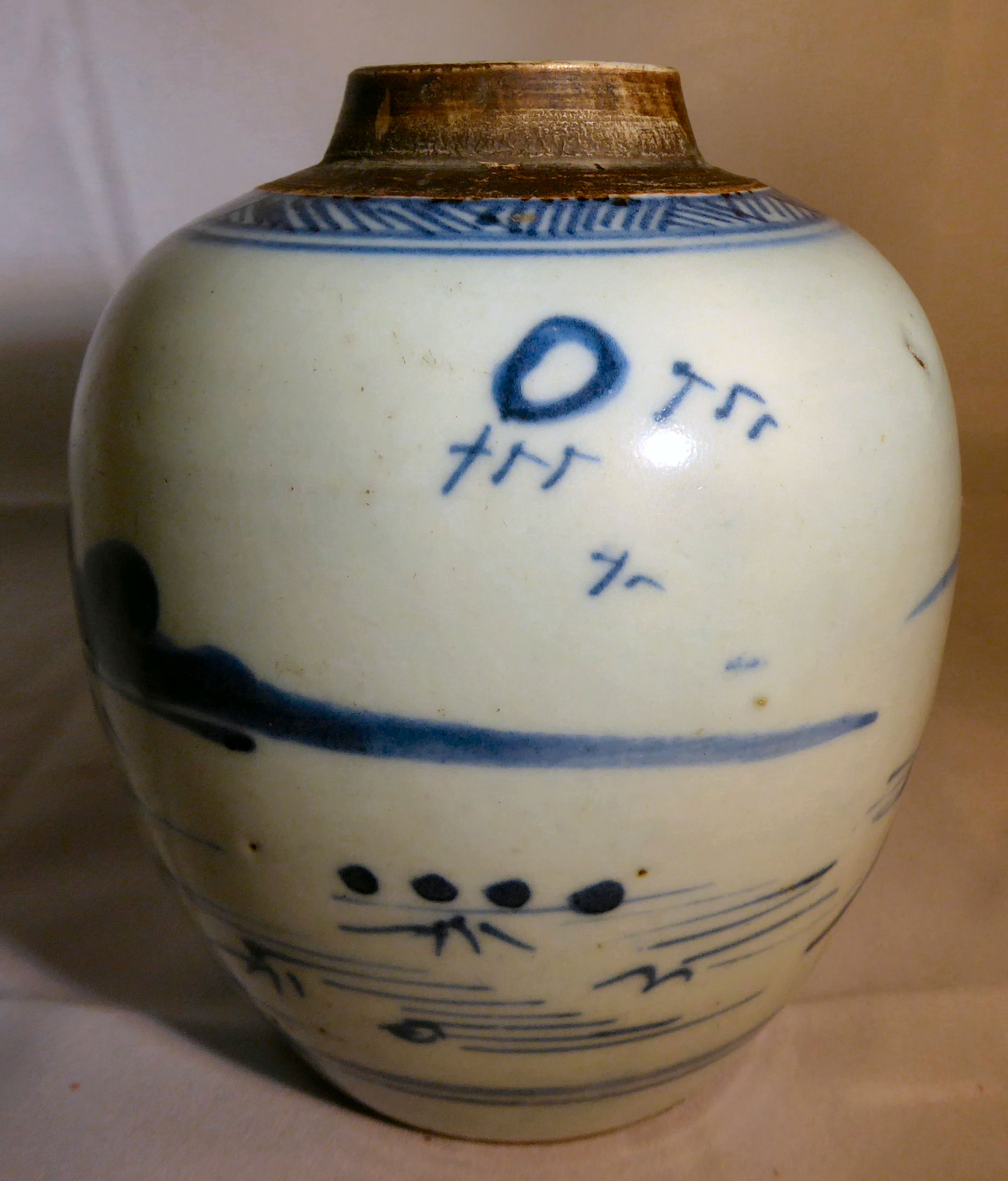 A late 19thC Chinese porcelain vase of squat, bulbous form,