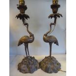 A pair of Edwardian cast brass table lamps,
