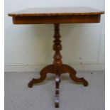 A mid 19thC European ebony and boxwood inlaid pedestal table,