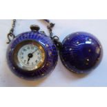 An early 20thC Continental violet coloured engine turned enamel and silver gilt pendant ball cased