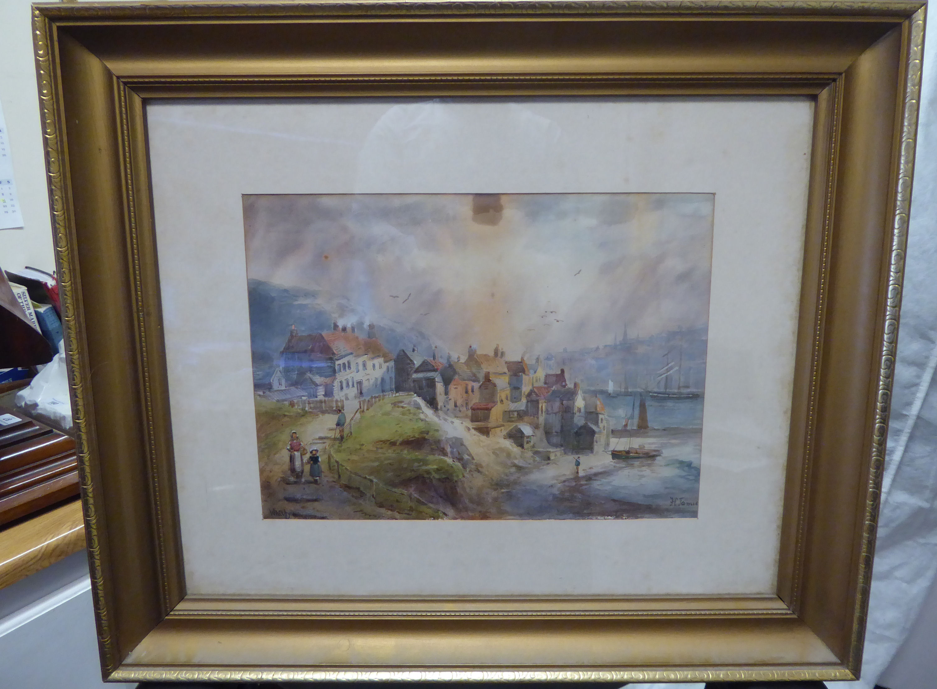 F E James - 'Whitby' with figures on a path in the foreground watercolour bears a signature 11''