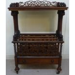 A late Victorian rosewood Canterbury/what-not, the top with a pierced, scrolled gallery,