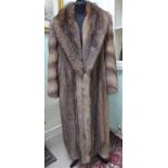 A Derbers full-length light brown mink coat with a collar and silk lining