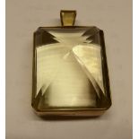 A 9ct gold pendant, set with a bevelled citrine of pyramid form 1.