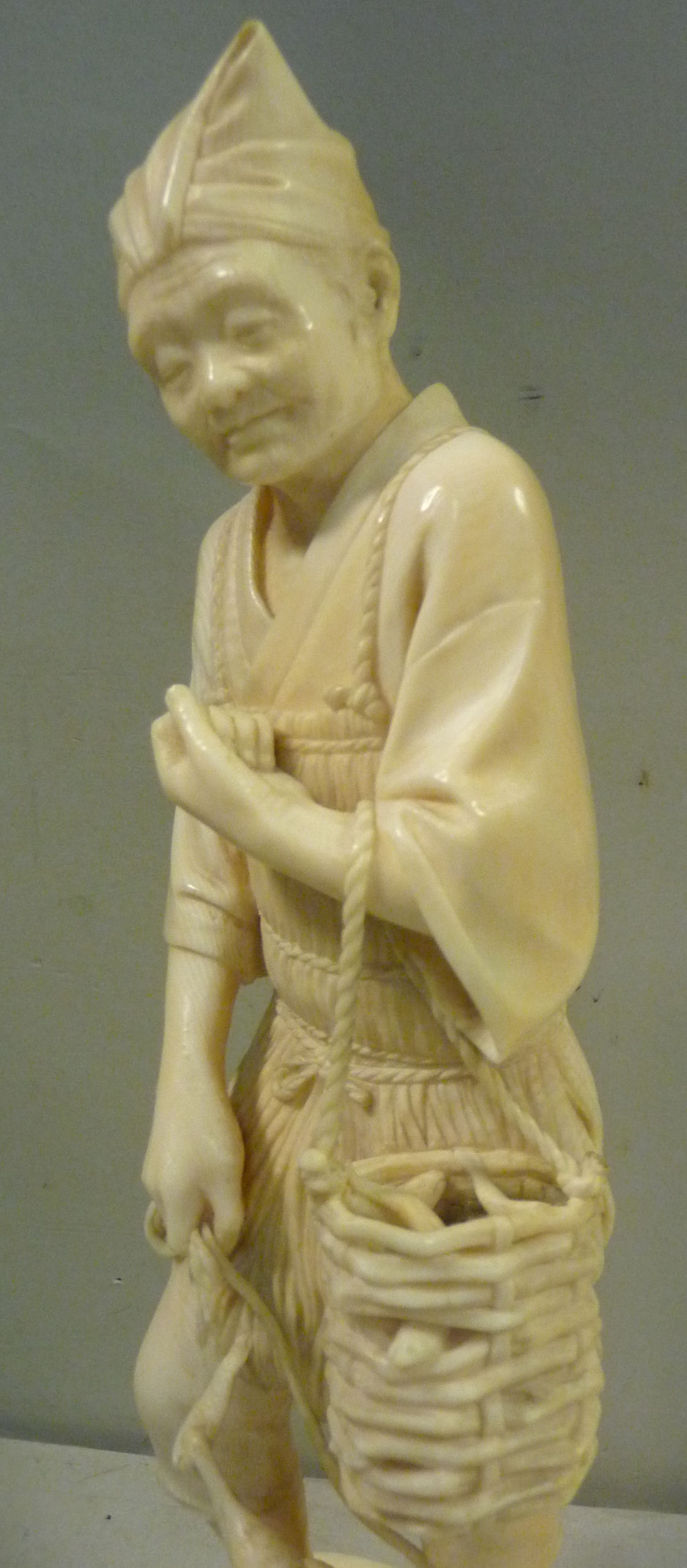 A 19thC Japanese carved ivory standing figure, - Image 5 of 8