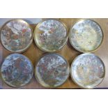 A set of ten late 19th/20thC Satsuma earthenware plates,