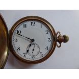 A 9ct gold cased half hunter pocket watch with enamelled black Arabic numerals,
