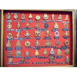 Forty-two military cap badges, for arms and services regiments, some copies,